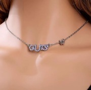 metalowy subtelny wisiorek naszyjnik Olivia Rodrigo - GUTS / krystaliczny