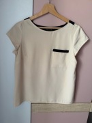 Beżowa bluzka z krótkim rękawem, z czarnymi wstawkami, Mohito