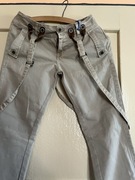 Spodnie damskie beżowe z odpinanymi szelkami marki Bershka, rozmiar 36.