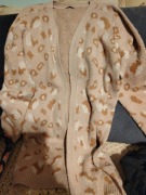 Sweterek bez zapięcia 146/152