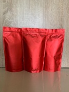 Doypack czerwony ze struną. Opakowanie po 100 szt.