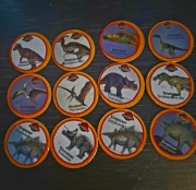 The Lost World żetony tazosy dinozaury 12 szt.