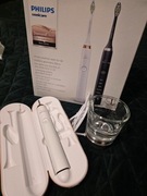 Szczoteczka uszkodzona i szklanka do ładowania + etui