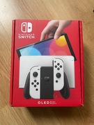 Nintendo Switch OLED - Biała + 4 gry