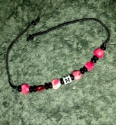 Bransoletka koraliki zawiązywana sznurek serduszka imię literka N czarna 