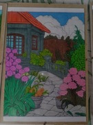 Obrazek pokolorowany kredkami w antyramie flexy