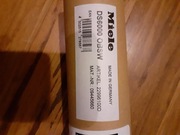 DS6000 OBSW Uchwyt drzwiczek Miele 