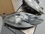 Lampa Reflektor Lewa + Prawa przednia original Fiat Bravo 2 II Lift EU kpl