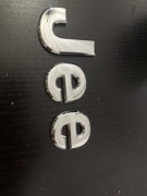 68207203AB emblemat maski Jeep Cherokee trailwalk