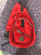Czerwony plecak kieszonki suwaki mountain adventure 89