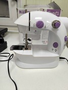 Maszyna do szycia w wersji podróżnej , na zasilacz i baterie 