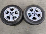 4x KOŁA alufelgi 185/65 R14 4X100 MAZDA NISSAN komplet opony letnie