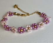 Bransoletka pleciona z koralików handmade kwiaty