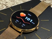 Smartwatch Maxcom FW27 Selen Gold na złotej bransolecie mesh.