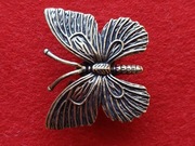 Figurka Mosiężnego Motyla.