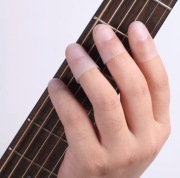 ZESTAW 4X SILIKONOWE NAKŁADKI OCHRONNE NA PALCE DO GITARY - ROZMIAR S