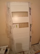 Nowe drzwi przylgowe Voster Murano 20 białe lewe, 80 cm, zamek wc