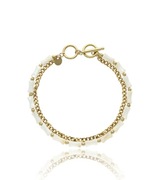 Bransoletka ze stali z muszlą naturalną z firmy YVON