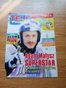 Plakaty i wycinki z gazet 