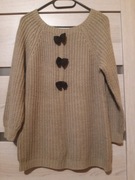 Sweter damski z kokardami