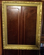 Stara drewniana rama w kolorze złotym,gipsowe zdobienia  