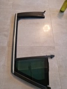 Uszczelka drzwi prawa tylnia wraz z szyba i dekorem insignia B kombi