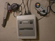 Super Pegasus z zasilaczem, padem, pistoletem .