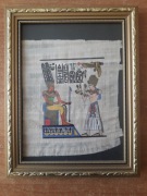 Papirus egipski w złotej ramce