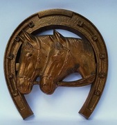 Emblemat podkowa , końskie łby w podkowie
