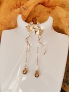 Złote kolczyki długie minimalistyczne Glamour 