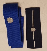 pagony, naramienniki i otok czapki mł. asp. Policji