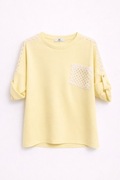 Żółta masełkowa bluzka z kieszonką