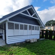 Ruchome żaluzje drewniane zabudowa na taras 