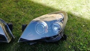 Reflektor biXenon Opel Astra H lewy