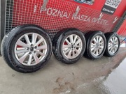Oryginalne felgi aluminiowe Mazda 17" 7J ET50 z oponami komplet