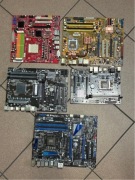 Uszkodzone płyty główne, na części.