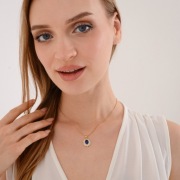 Naszyjnik ze stali szlachetnej z niebieskim kryształem i oprawą z cyrkonii