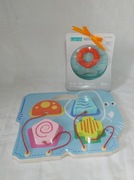 Zestaw: gryzak silikonowy + drewniana układanka w kształcie słonia.