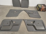 BMW E30 Boczki drzwi komplet sedan 4d + maskownice foteli