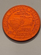 Samochód Praga. Moneta aluminiowa fi 35 mm. Gyges