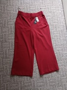 Materiałowe spodnie z szeroką nogawka 