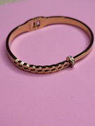 Bransoleta w kolorze złotym 