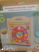 Edukacyjny drewniany zegar z liczydłem. Elefun
