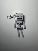 Ruchomy brelok szkielet – figurka antystresowa 3D (styl pixel)