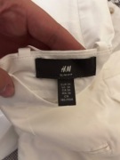 Białe spodnie HM slim fit 36