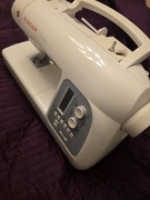 Hafciarka Singer Futura XL-550 – Bogaty zestaw nici i akcesoriów