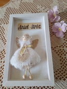 Aniołek w białej ramce 