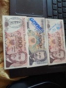 Trzy oryginalne banknoty z nadrukiem
