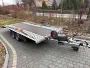 Wynajem przyczepy laweta 2100kg DMC, 1520kg ład B+E, płaska uchylna