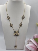 Naszyjnik kwiatki czarno złote z cyrkonią.